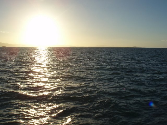 sunset reflecting over the ocean