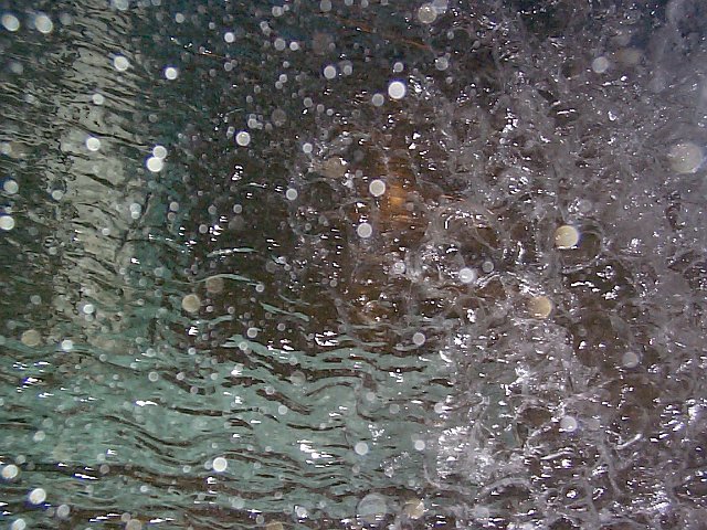 study of water and reflections in a camera flash