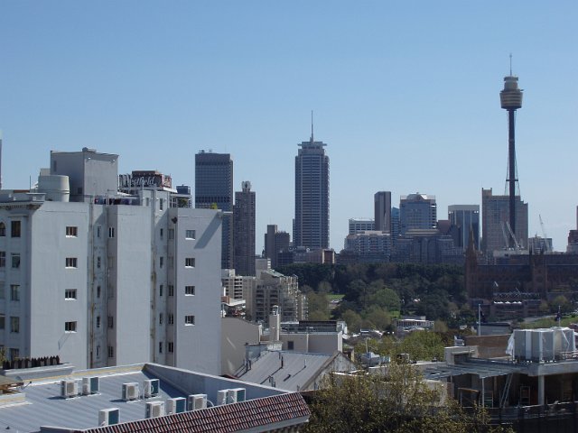 buildings forming a large city skyline pictured in the daytime