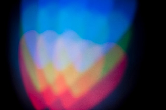 colorful overlapping light hearts with a grain texture