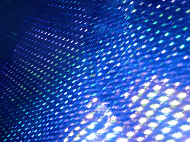 abstract background of green and blue lights with a slight motion blur