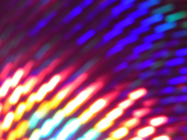 colorful spectrum of light with burnt out highlights fading to shadows