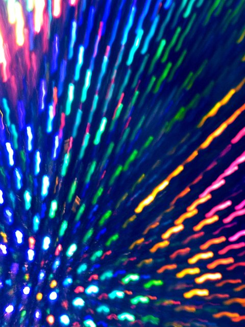 zoom blurred background with a vivid spectrum of light trails