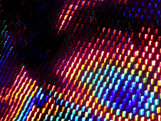 a contour map of coloured lights with a motion blur