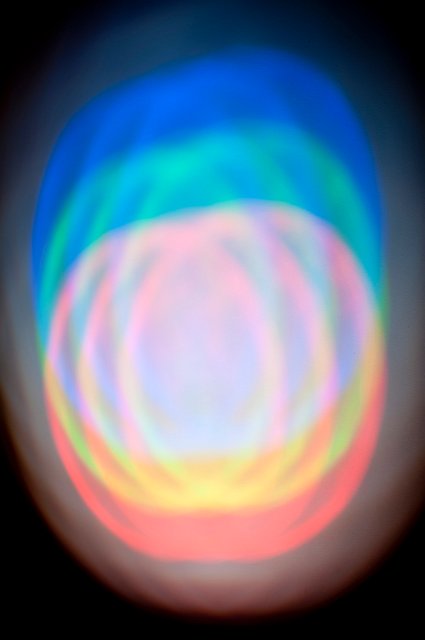 white coloured light created from overlapping red green and blue
