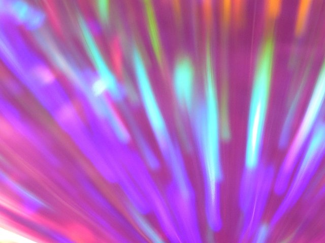 abstracted motion blur with generally pink and purple tones