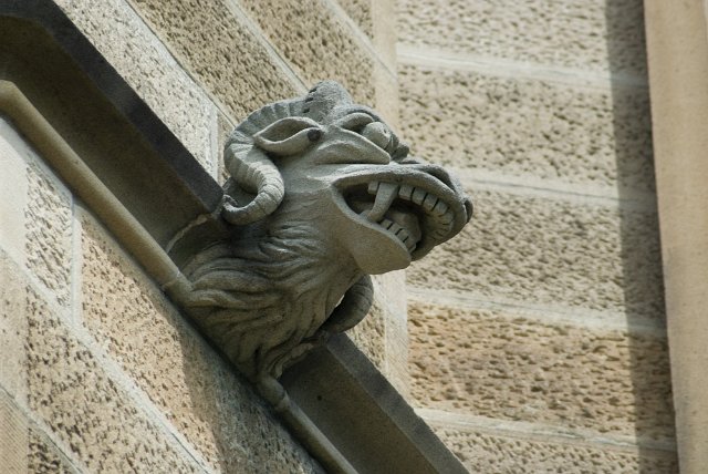 stone scuplture beastie with rams horns