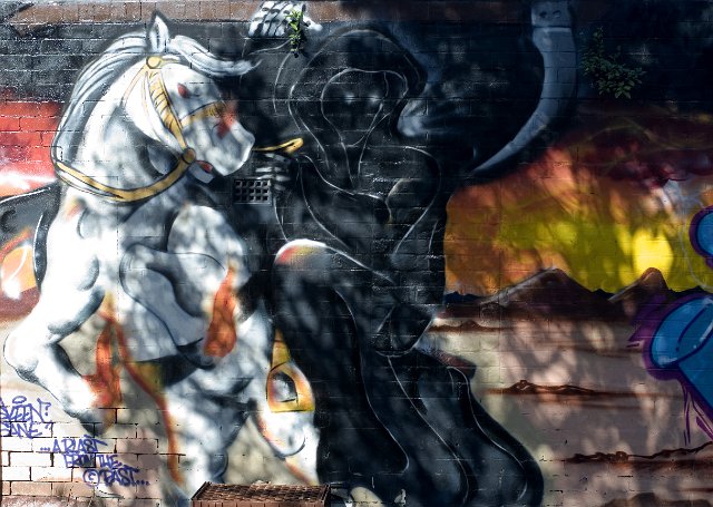 Graffiti artwork grim reaper and white horse