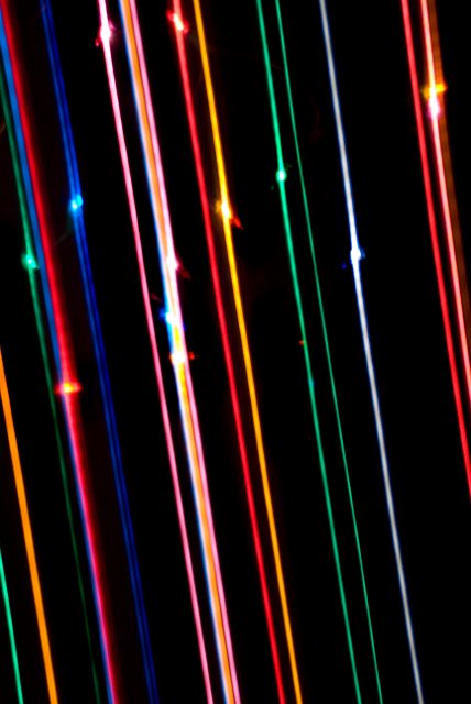 abstract background: lines of light falling from the sky