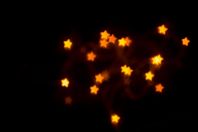 bright glowing boke star shapes