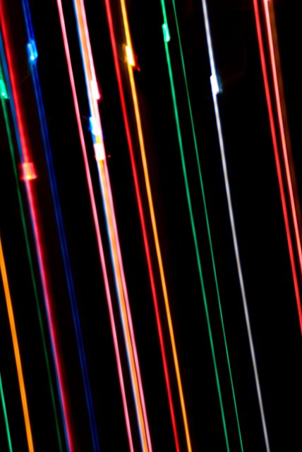 abstract background: lines of light falling from the sky