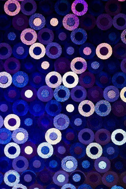 metallic blue and purple circular background
