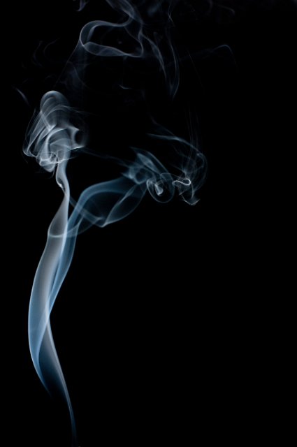 an unusual eye catching background of soft smoke rising and twisting
