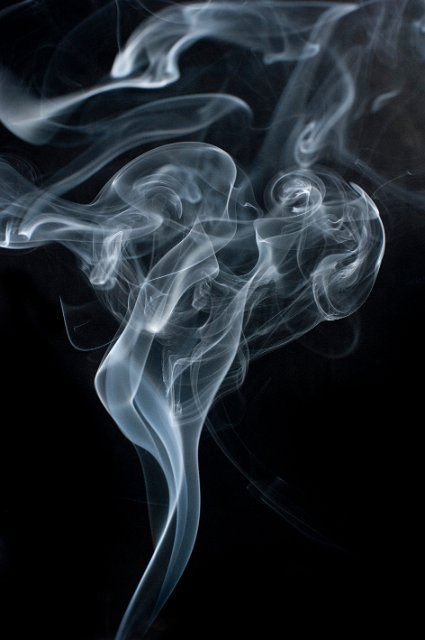 an unusual background composed of a misty cloud of smoke