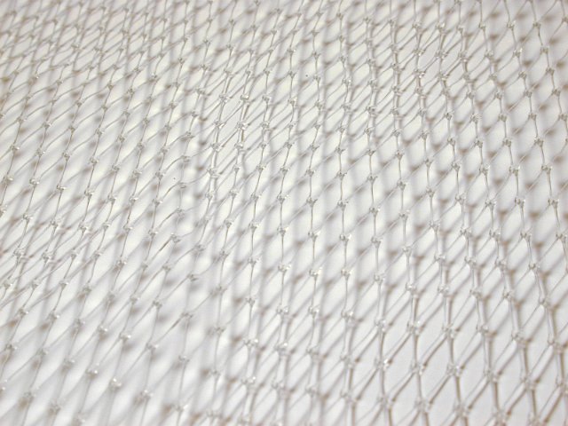 fine synthetic mesh texture on white background