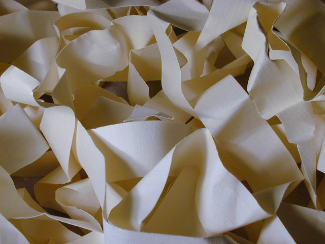 crushed beige paper strips