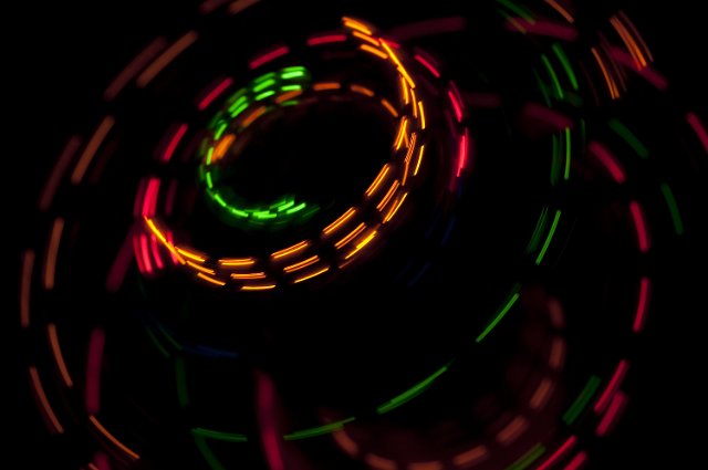 colorful dashed lines of light creating a circular pattern