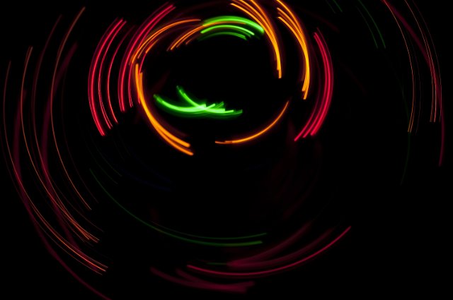 bright colours of curved light plotted on a black backdrop