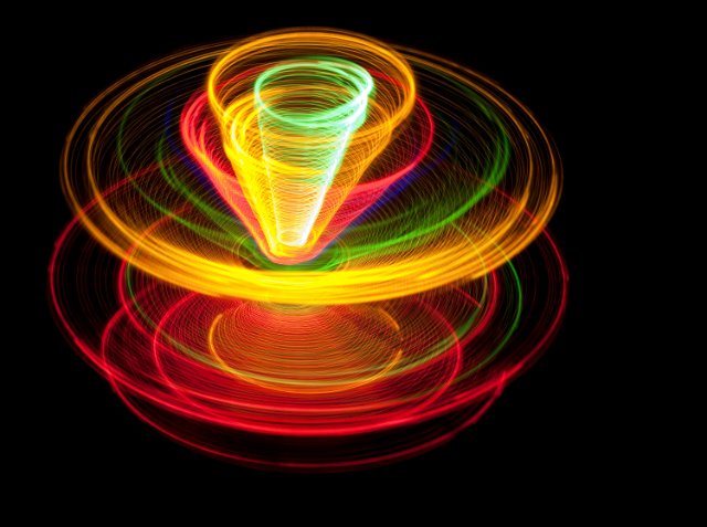colorful lights spinning around a central axis