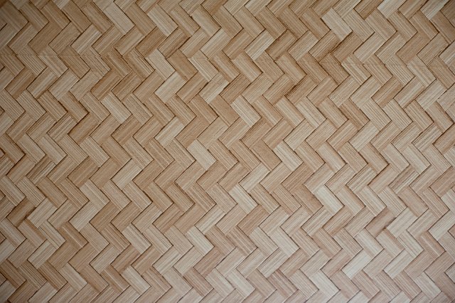 Background texture of bamboo weave in a neat repeating zig zag pattern