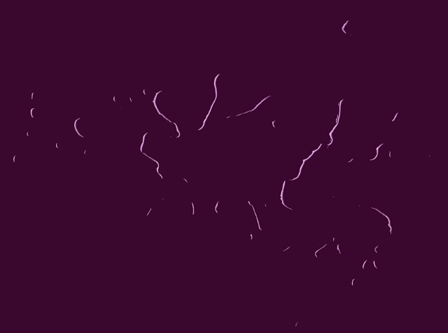 outlines of water drops on top of a scanner