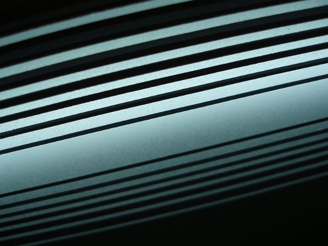 white illuminated parallel lines of varying widths