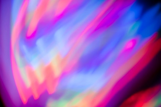 abstract pattern formed by mixing red and blue lights