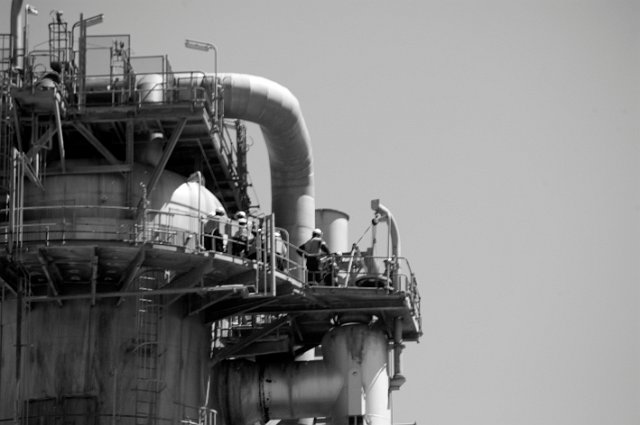 defocused black and white view of refinery plant - not model released