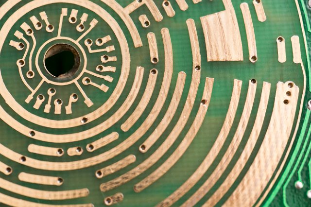 a printer circuit board with broken concentric copper tracks that form part of a rotary switch