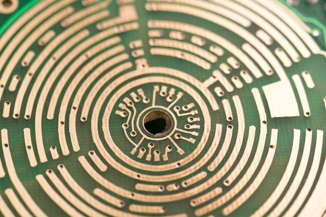 broken concentric curvess traced on a circuit board