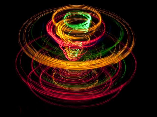 color and movement depicting in a spiraling pattern of light